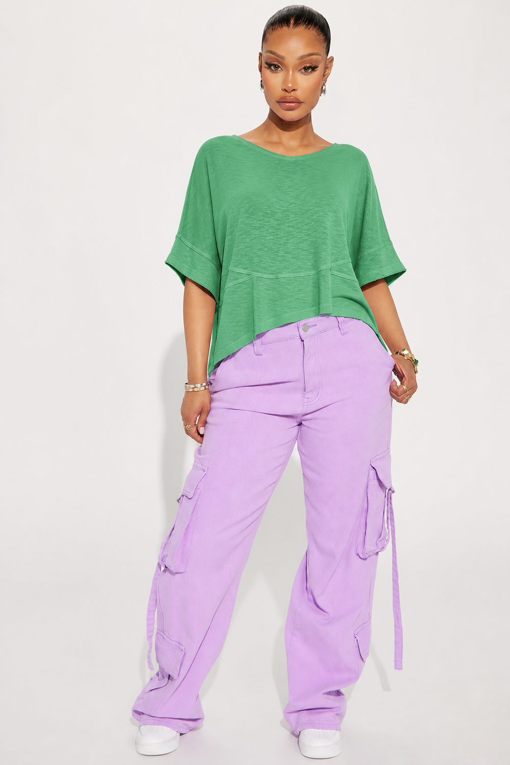Women's Casual Green Half Sleeve T-Shirt With Asymmetrical Neck Drop Shoulder And Exposed Seam Details Made From Polyester Regular Length